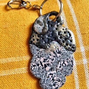 Handmade polymer keychain.........4.5 inches long and 2 inches wide.